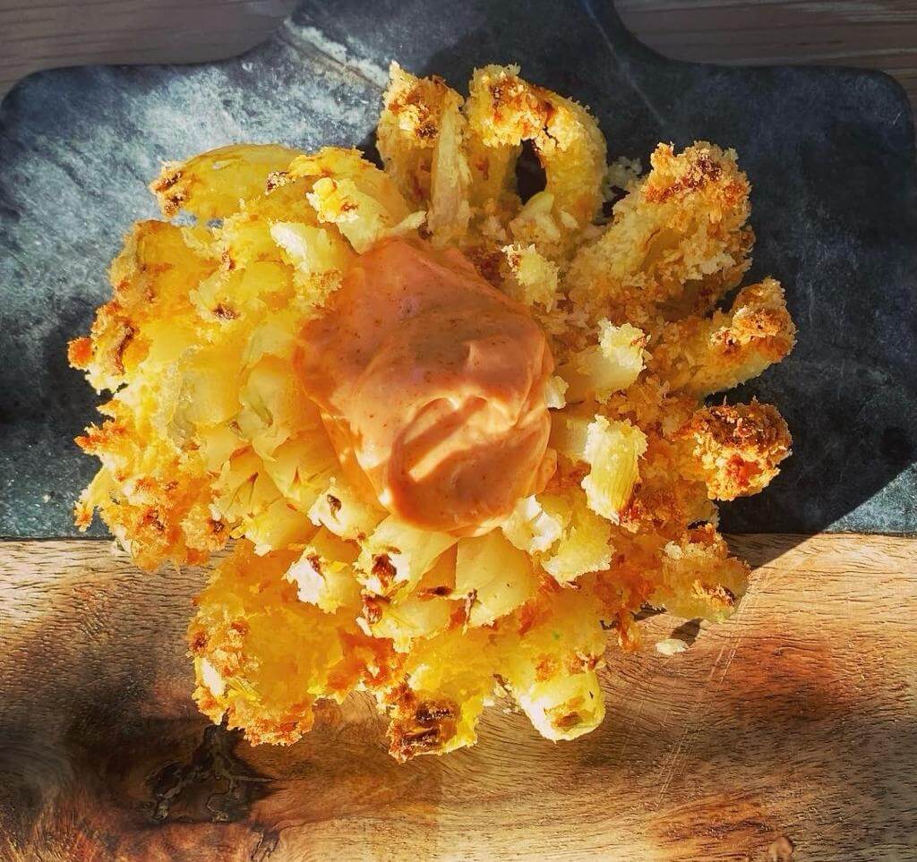 Air fryer blooming onion with a paprika dip